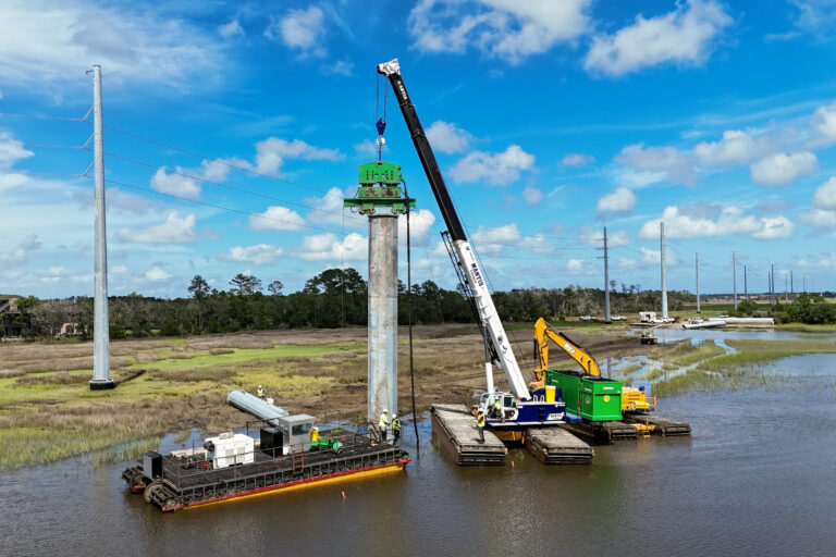 Progress continues as crews advance critical infrastructure work in challenging coastal conditions.